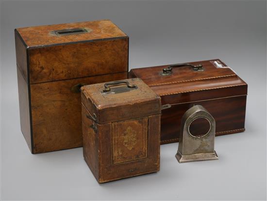 A George III tea caddy, a Victorian decanter box, a carriage clock case and a silver watch frame (4)